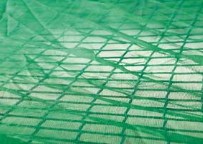 Overlay panel in green, air permeable